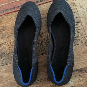 Black and gray tweed round-toe Rothys flats, size 9.  Like new condition.